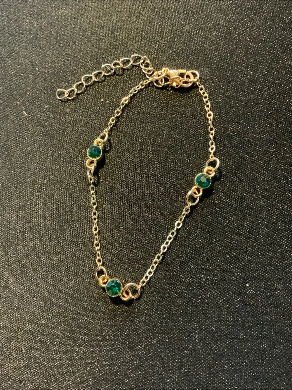 Gold Tone Chain Bracelet with Green Gem Accents